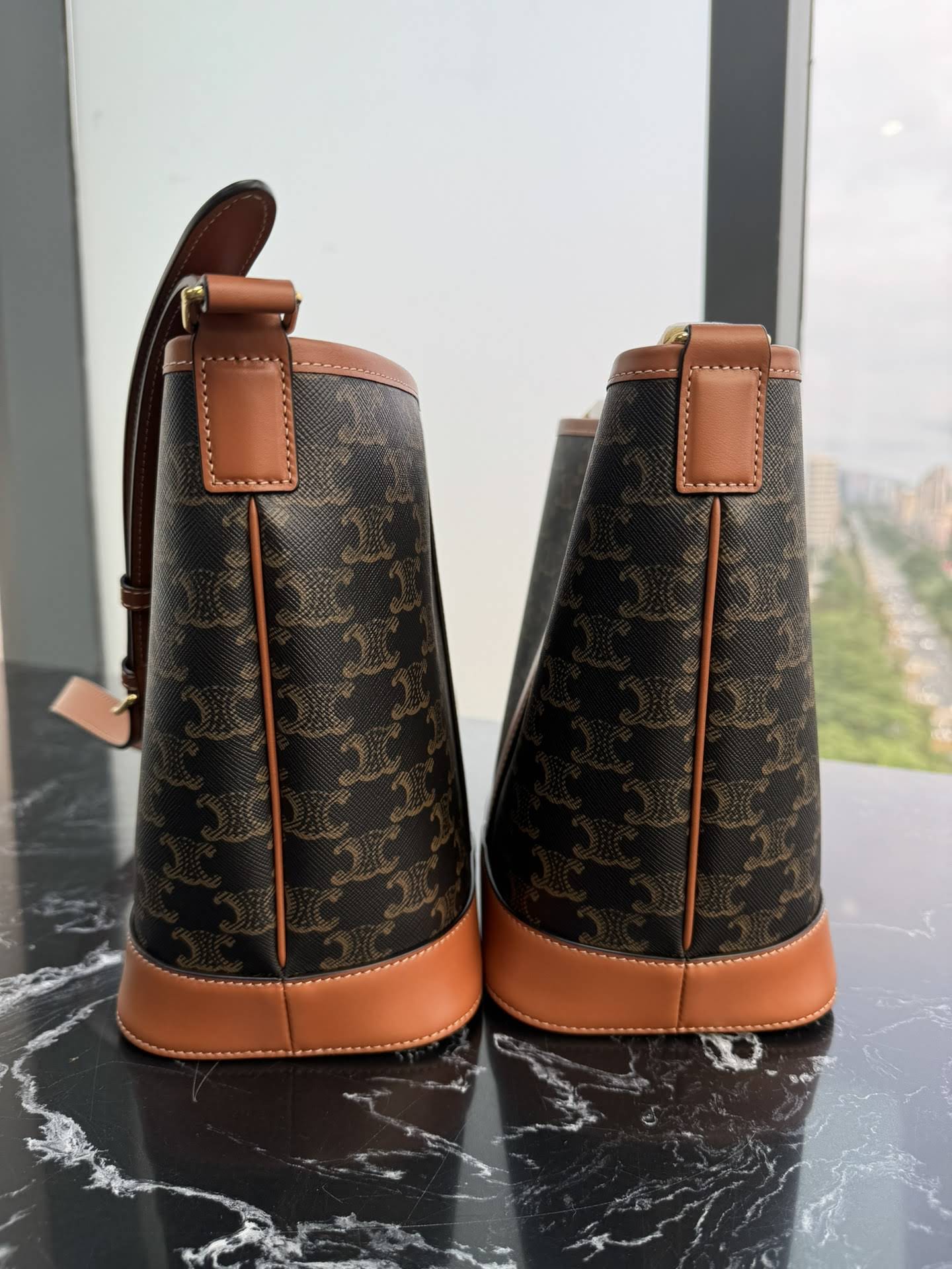 CELINE SMALL BUCKET IN TRIOMPHE CANVAS AND CALFSKIN