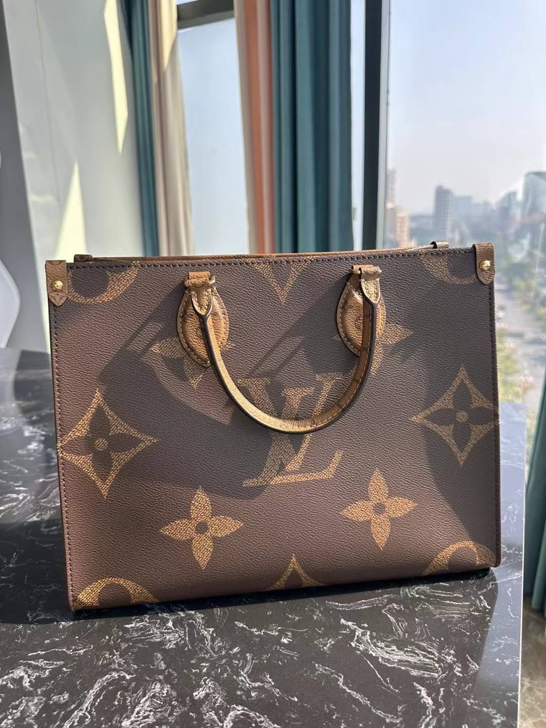 LOUIS VUITTON The OnTheGo PM Tote Bag