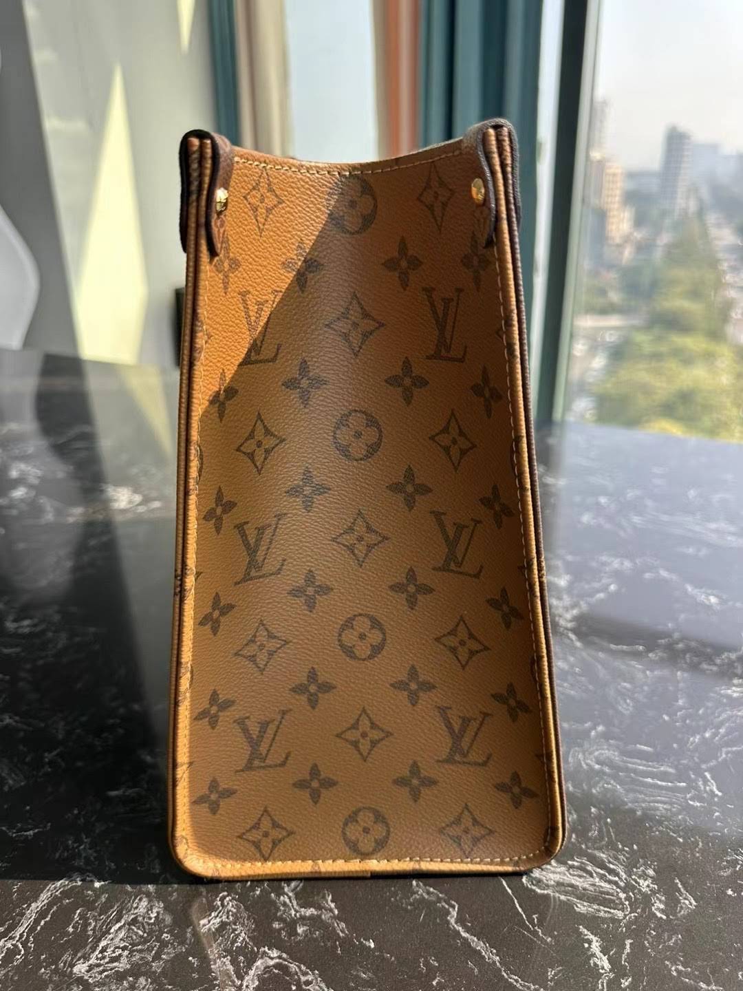 LOUIS VUITTON The OnTheGo PM Tote Bag