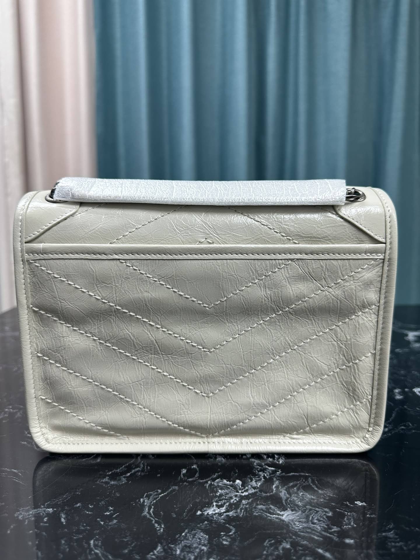 SAINT LAURENT NIKI BABY IN VINTAGE LEATHER (white)